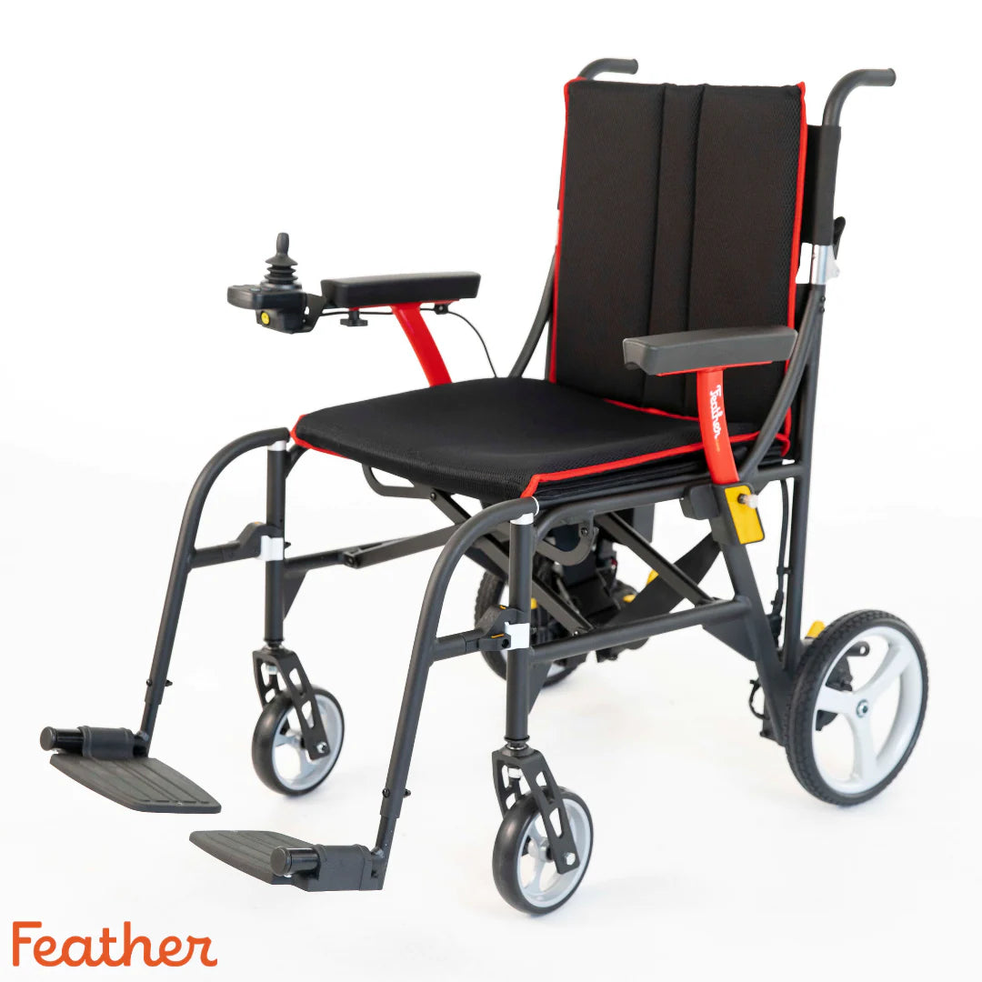 Feather Power Chair – 33 lb foldable power wheelchair with joystick control, padded seat, and red accent frame