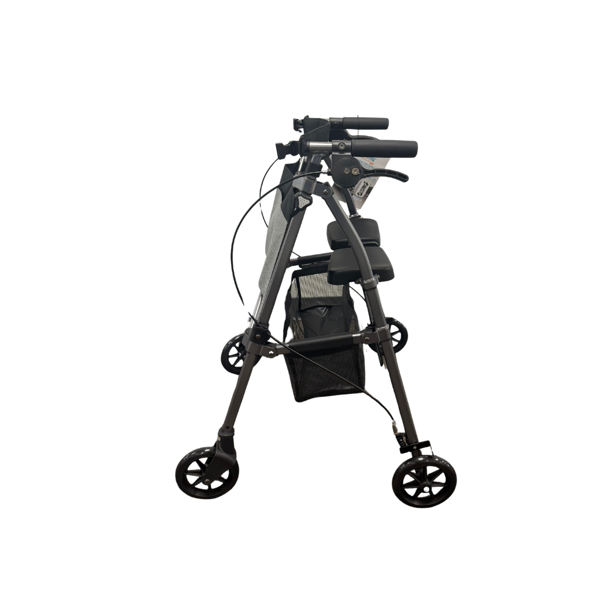 Stander Wonder Rollator Plus shown folded from the side, displaying compact storage profile with handles, brakes, and basket
