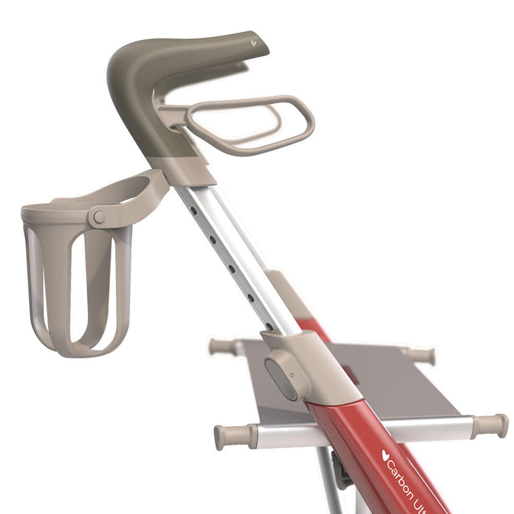 Close-up of a folding chair with beige handle and red frame on a white background