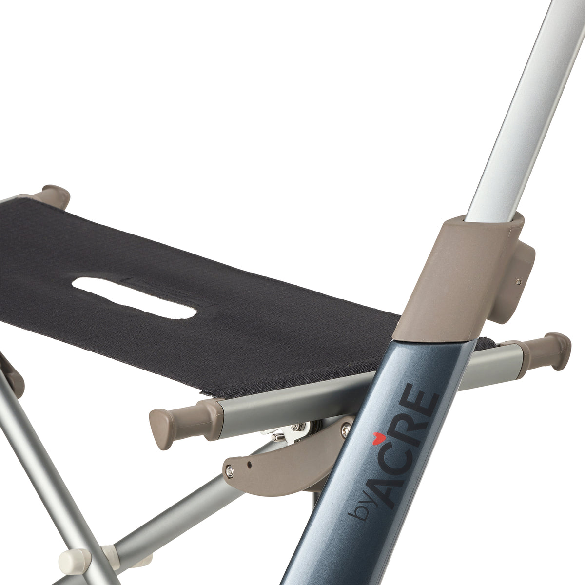 Close-up of a folding rollator frame by ACRE, showing a black fabric seat cushion, silver metal legs, and taupe plastic joints on a white background.