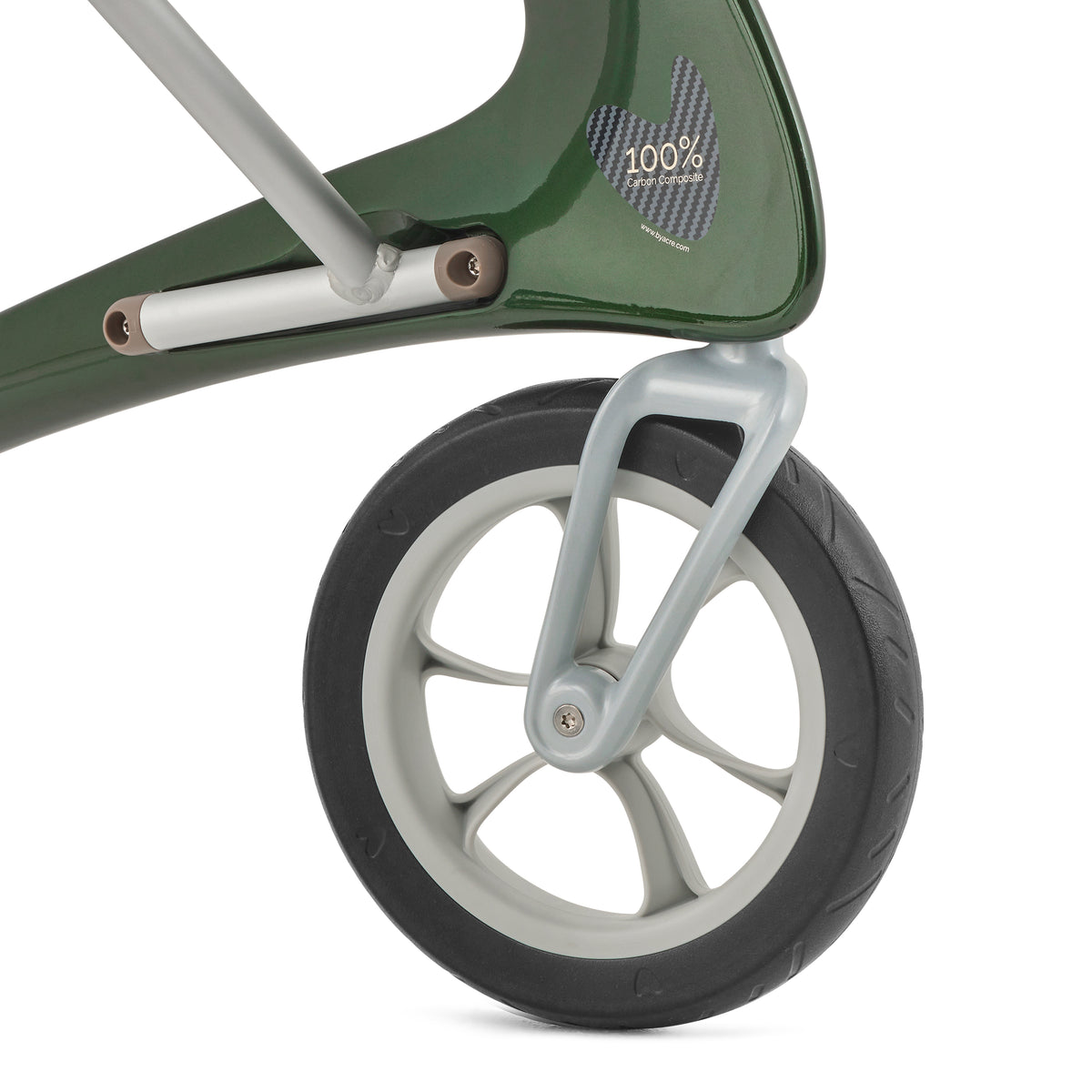 Green rollator on white background showing wheels up close