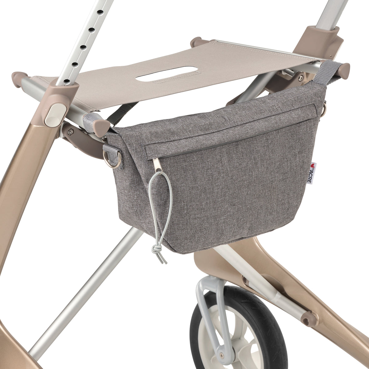 Gray rollator organizer attached to a beige rollator on a white background