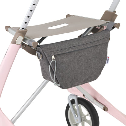 Pink rollator with grey storage pouch