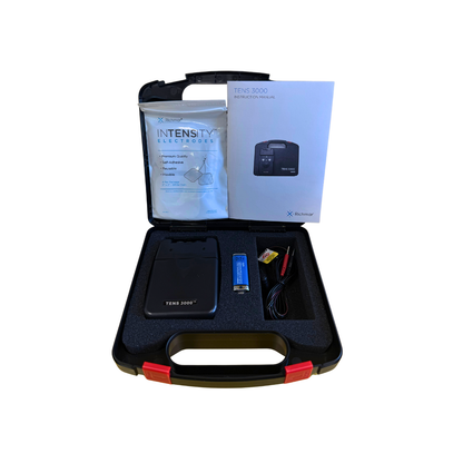 Electrotherapy System TENS 3000™ 2-Channel kit with carrying case, electrode pads, battery, lead wires, and instruction manual for pain relief therapy.