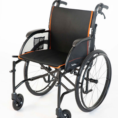 Wheelchair with black seat and orange accents on a white background