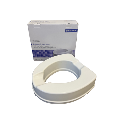 McKesson raised toilet seat with retail box for added bathroom comfort, support, and accessibility.