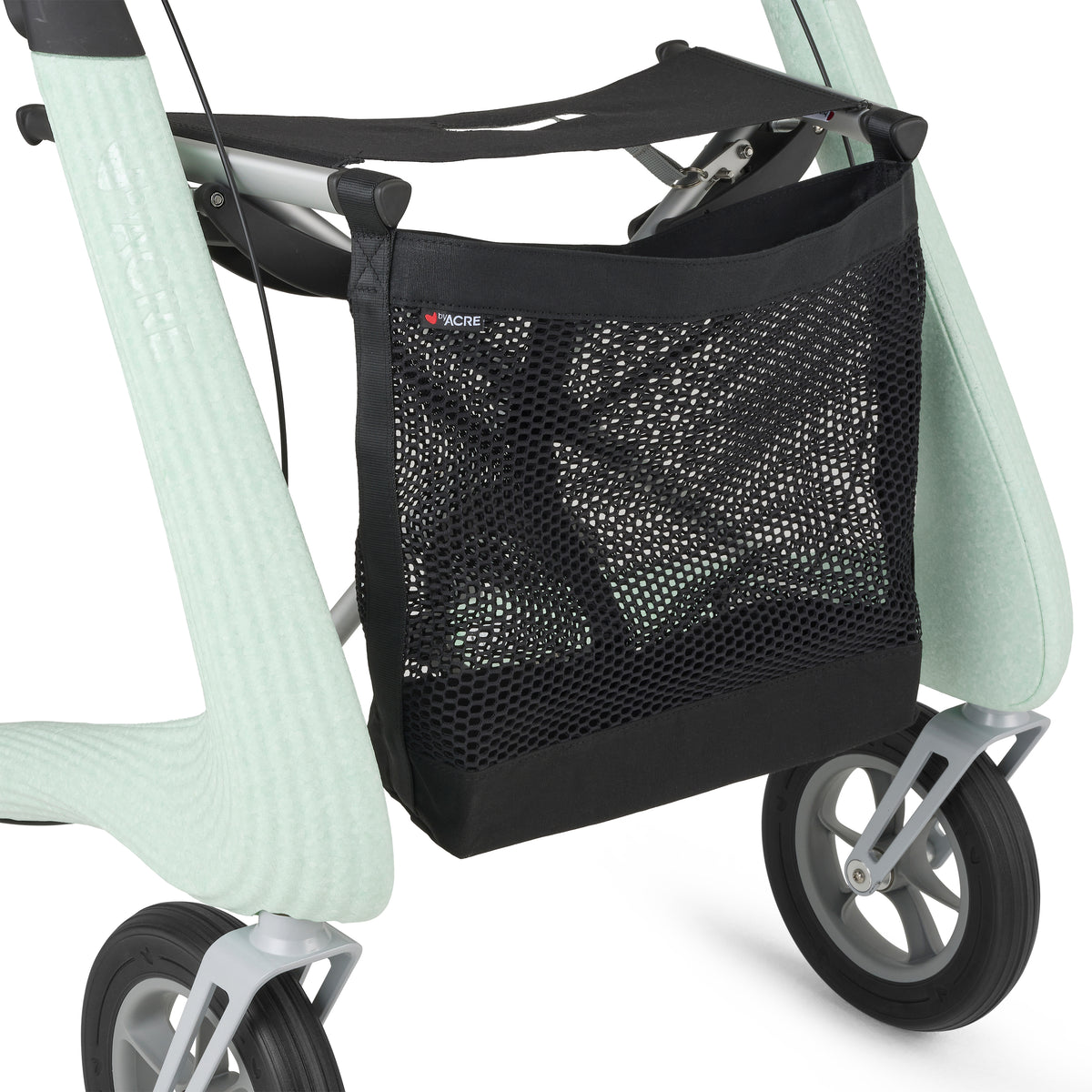 Black mesh storage bag attached to a light green rolaltor on a white background