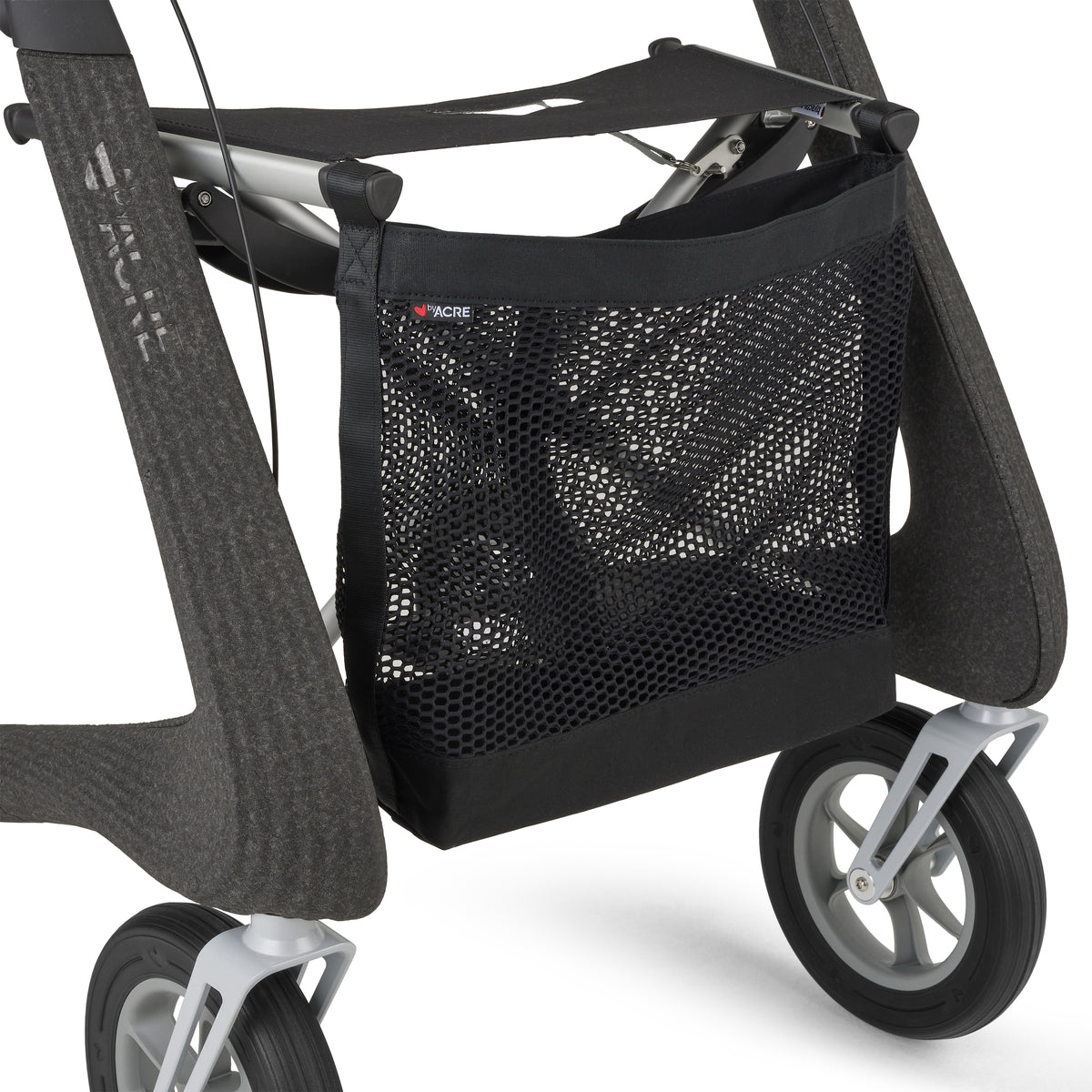 Black mesh bag attached to a rollator on a white background
