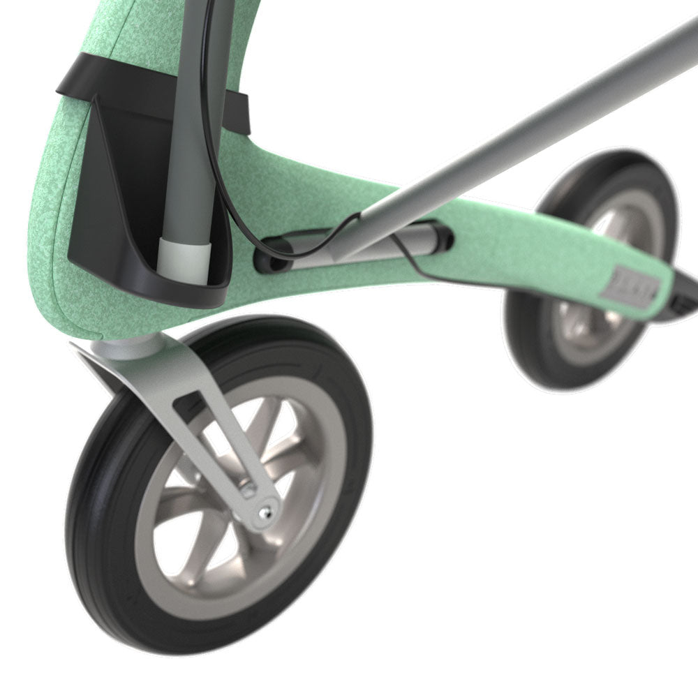 Close-up of a green rollator with black wheels on a white background