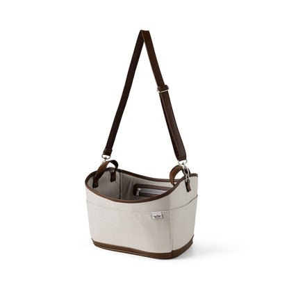 Beige rollator bag with brown accents on a white background
