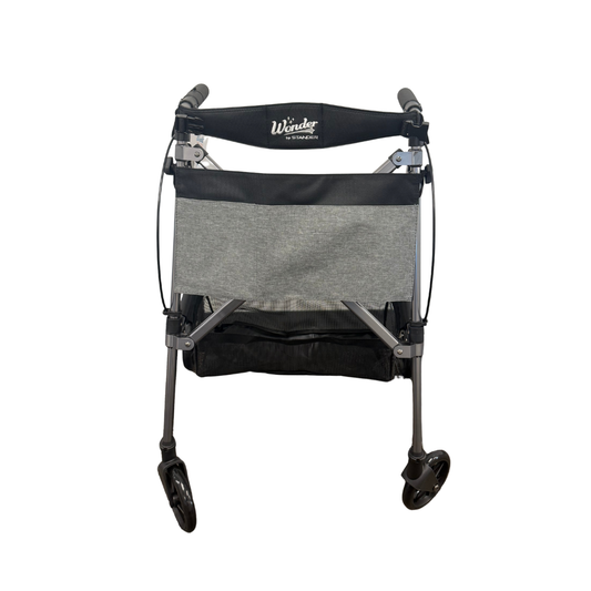 Stander Wonder Rollator Plus 4-wheel rollator walker with seat, mesh basket, and locking brakes – front view