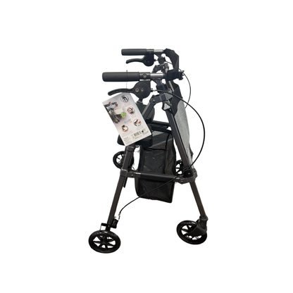 Stander Wonder Rollator Plus 4-wheel rollator walker showing handle brakes, mesh basket, and folding frame – side angle view