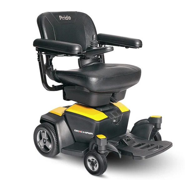 A black and yellow power wheelchair with a padded seat, armrests, and a footrest, photographed on a clean white background. The brand name 'Pride' is visible on the backrest, and 'GO CHAIR' is printed on the side.