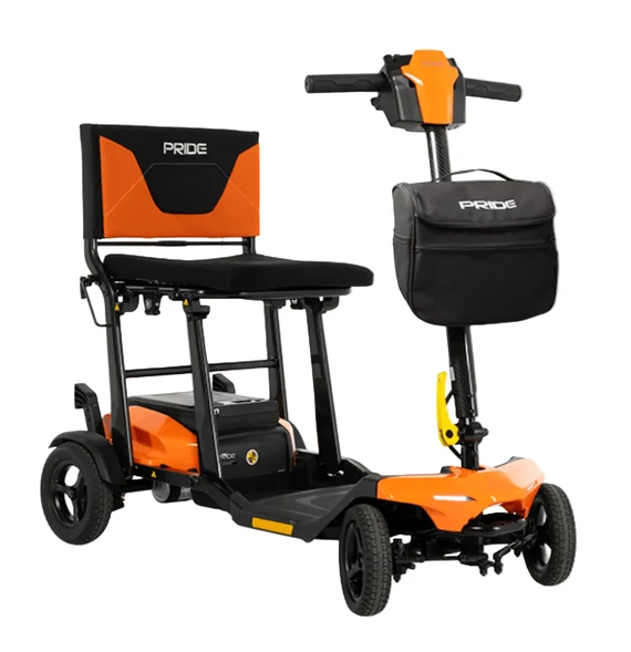 Pride electric mobility scooter with a rear-facing passenger seat, black and orange body, three wheels, and a matching black storage bag on a white background.