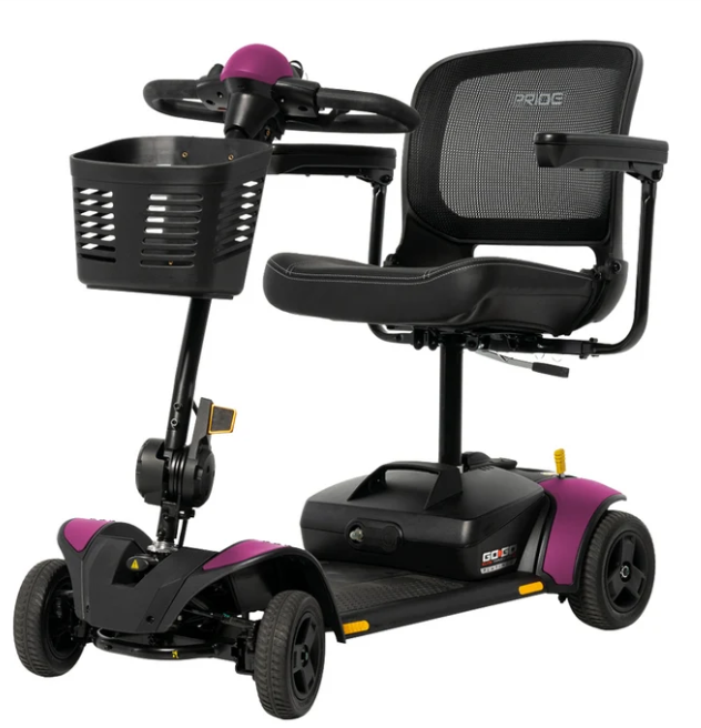 A black and purple GO-ERG mobility scooter with a built-in front basket, black mesh back seat, and three wheels, shown on a solid white background.
