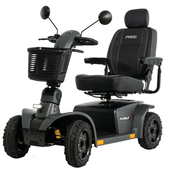 A black and dark gray four-wheel electric mobility scooter with a front basket, side mirrors, and a padded seat with the brand name PRIDE visible on the backrest.