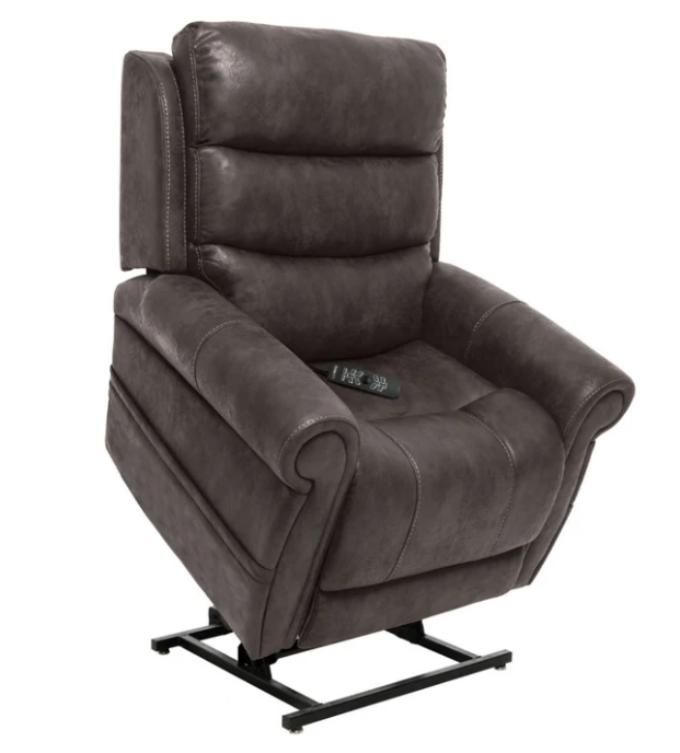 A dark brown upholstered recliner chair with a high back, padded armrests, and a black metal lift base, shown on a plain white background. A remote control rests on the seat.