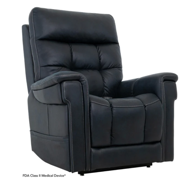 Black faux leather recliner chair with tufted backrest and padded armrests, shown on a white background with small FDA Class II Medical Device text at the bottom left.