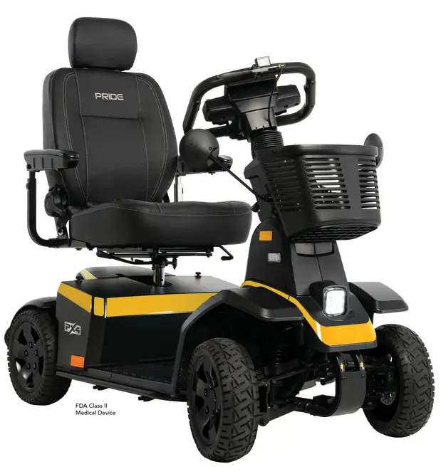 A black and yellow Pride FX4 Class II medical mobility scooter on a solid white background, featuring a high-back seat, front basket, and four rugged tires.