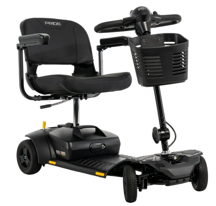 A black electric power wheelchair with a high-back seat, steering wheel, front basket, and three wheels, shown on a plain white background. The brand name 'PRIDE' is visible on the backrest, and 'GO 300' is visible on the side panel.