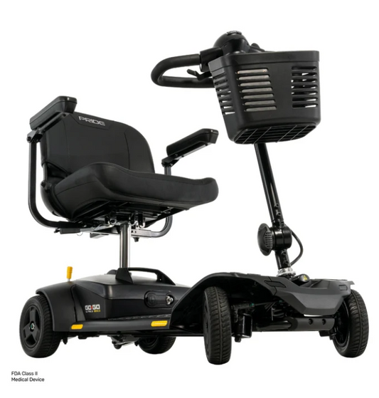 A black Power Soco Class II medical power wheelchair with a seat, four wheels, a front basket, and a tilt handle, shown on a white background.