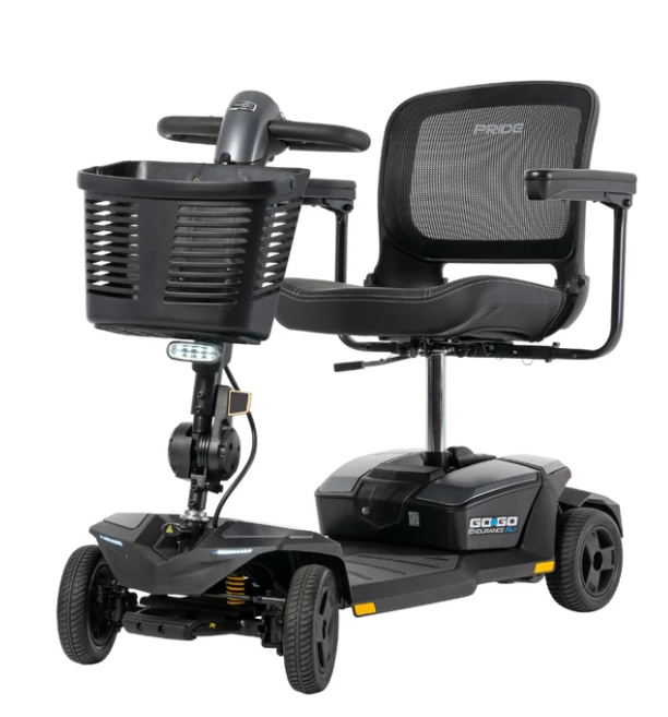 Black Pride Go-Go 2 electric mobility scooter with a front storage basket, mesh back seat, and rear wheels, shown on a solid white background.