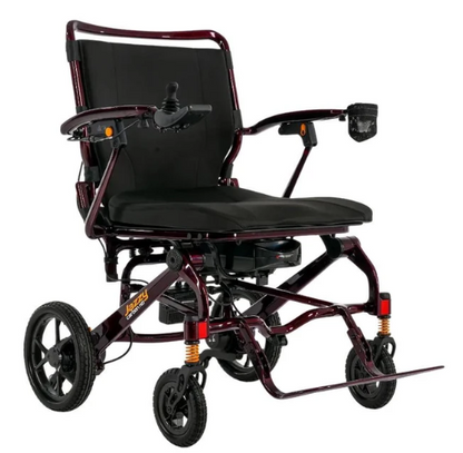 A motorized folding wheelchair with a dark burgundy frame, black seat and backrest, and black wheels, shown on a plain white background.